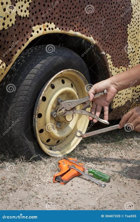 Repair flat tire stock photo. Image of maintenance, wrench - 30407320