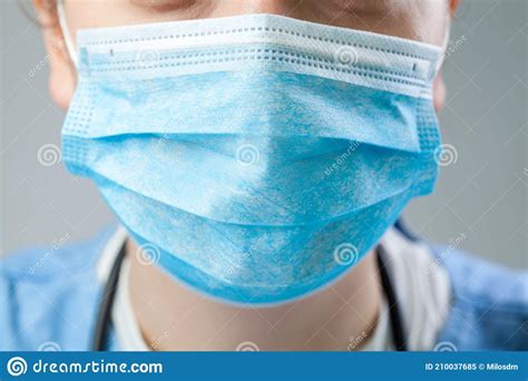 Caucasian Doctor or Nurse Wearing Blue Protective Surgical Face Mask Stock Image - Image of ...