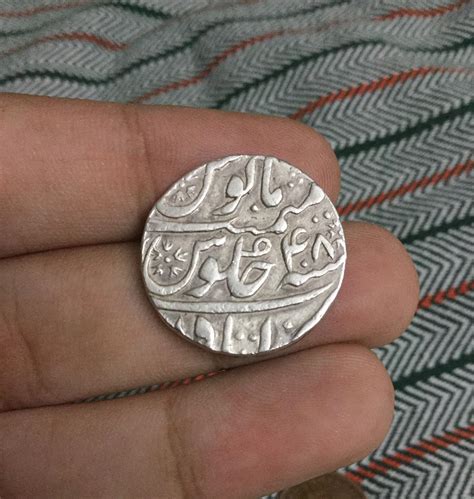 Silver rupee of Mughal empire from 1704 : r/coins