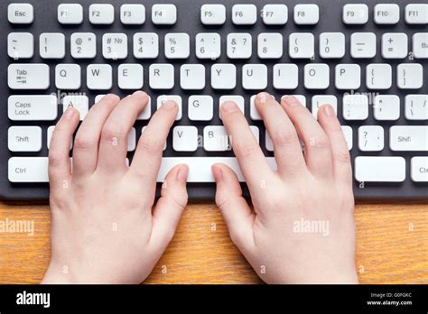 Top view of hands typing on computer keyboard Stock Photo - Alamy