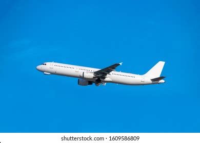 Passenger Plane Taking Off Into Blue Stock Photo 1609586809 | Shutterstock