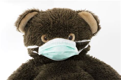 Teddy bear with mask stock image. Image of sickness - 179514367