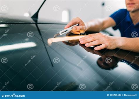 Worker with Blade, Car Tinting Film Installation Stock Photo - Image of ...