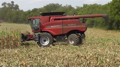 Corn combine harvester - YouTube