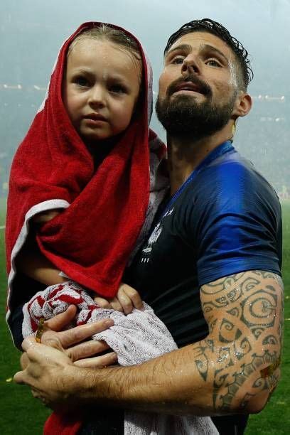 France's forward Olivier Giroud celebrates with his daughter after the ...