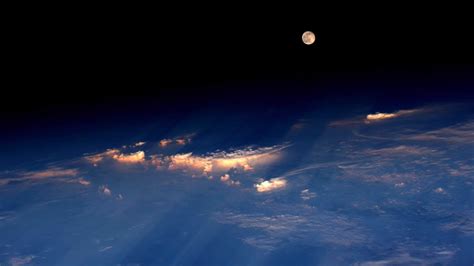 Astronaut in space snaps dramatic photo of the full moon caught in a ...