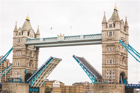 Tower Bridge in London with drawbridge open — Stock Photo © william87 #68525941