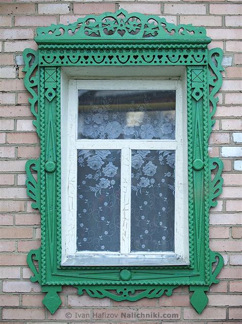 Brick house with wooden carved window frames | | Nalichniki.com