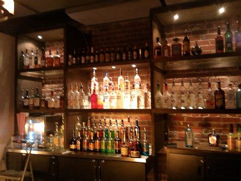 bar shelves - Google Search | Basement bar designs, Bar shelves, Commercial bar design ideas