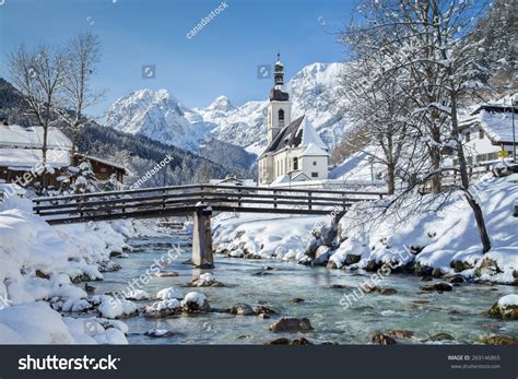 Panoramic View Of Scenic Winter Landscape In The Bavarian Alps With Famous Parish Church Of St ...