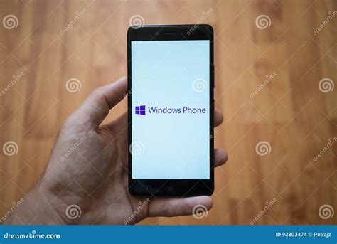 Windows Phone Logo on Smartphone Screen Editorial Stock Image - Image of laminate, hand: 93803474