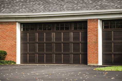 Walnut Steel Garage Door │ Wayne Dalton | Garage doors, Garage door styles, Carriage house doors