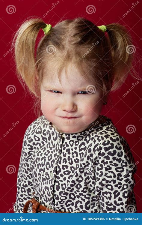 Portrait of Little Girl with Bright Facial Expressions, she is Angry and Pouting Stock Photo ...