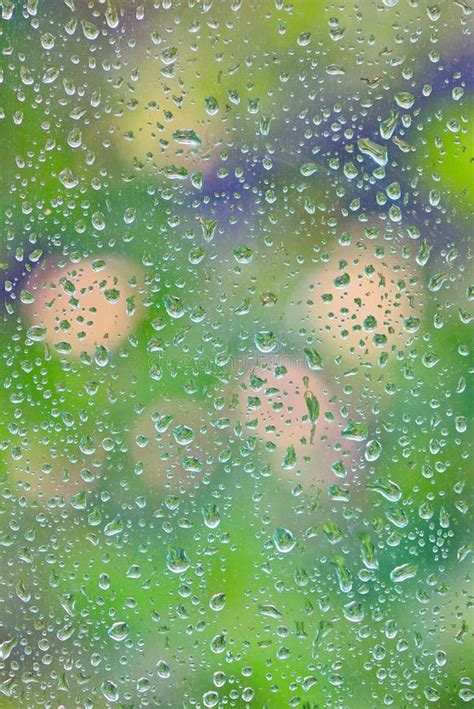 Rain drops on a window stock photo. Image of bubbles - 43067184