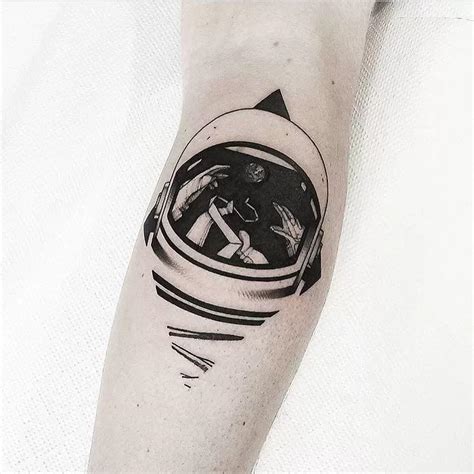 Black Astronaut Helmet Tattoo - TATTOOGOTO