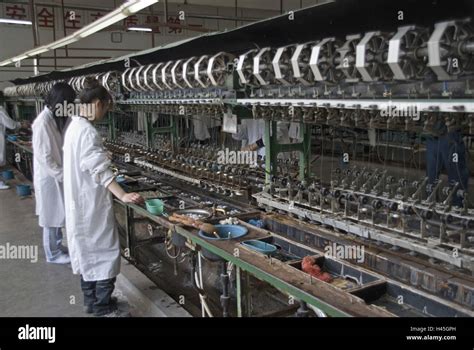 China, Shanghai, silk spinning mill, workers, machine, production, no model release, no property ...