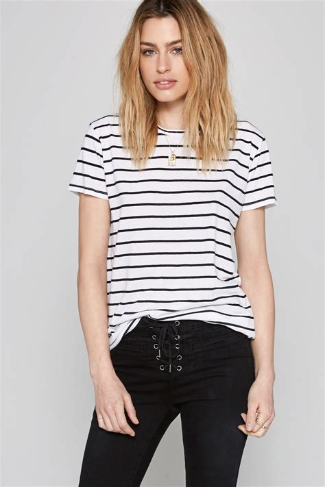 The Tanner Tee features a yarn dye stripe and has binding detail. | Striped tee, Striped, Fashion