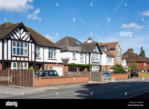 Suburban houses on Camphill Road, West Byfleet, Surrey, England, United ...