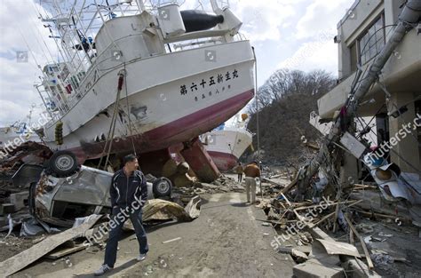 Japanese Tsunami Survivors Investigate Damage Caused Editorial Stock ...