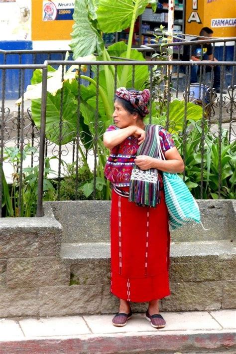 A lady wearing traditional Mayan clothes in Nebaj, Guatemala | Maya girl, Mayan clothing ...