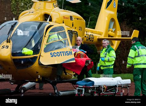 Scottish Ambulance Service Helicopter attends an incident in South Lanarkshire , Scotland Stock ...