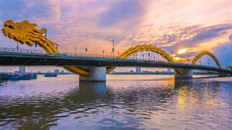 This is the Dragon Bridge, Da Nang, Vietnam (at night it literally ...