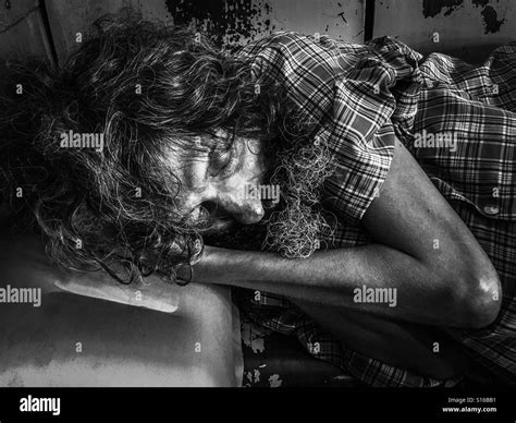 An injured man sleeping in the train Stock Photo - Alamy