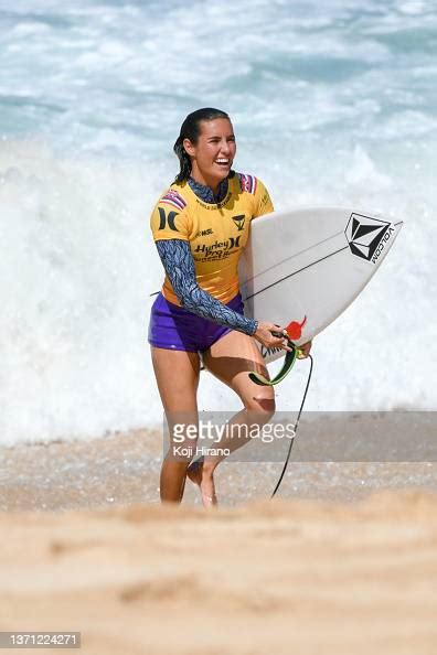 Moana Jones Wong of Hawaii surfs wearing the Yellow Jersey in Heat 1... News Photo - Getty Images