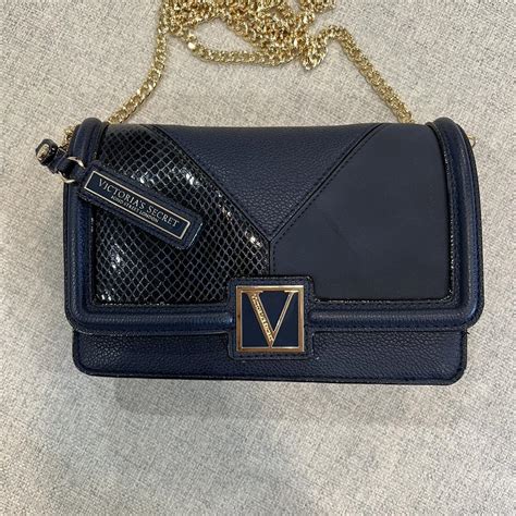 Victoria secret cross body bag navy/gold - Depop