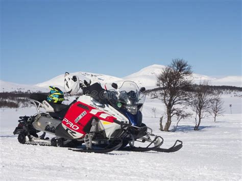 Snowmobile On Mountain Peak Stock Photo - Image of snow, cold: 18779560