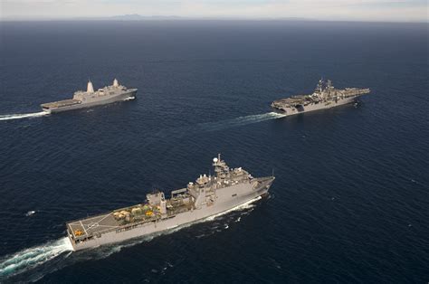 Three US amphibious warfare ships - an LHD leading an LPD (rear) and an LSD (fore)[3,000x1,992 ...