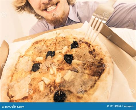 Man Eating Pizza, Having Fun. Stock Photo - Image of positive, cuisine: 111193204