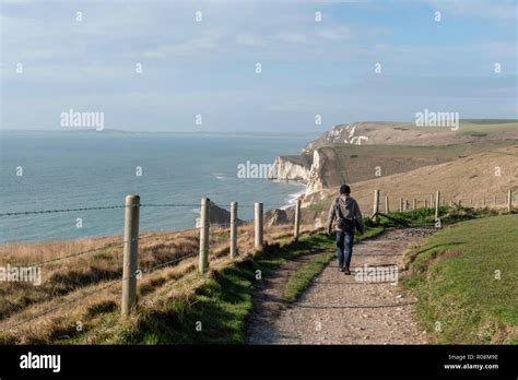 Man hiking in Durdle Door, West Lulworth, Dorset, England Stock Photo - Alamy