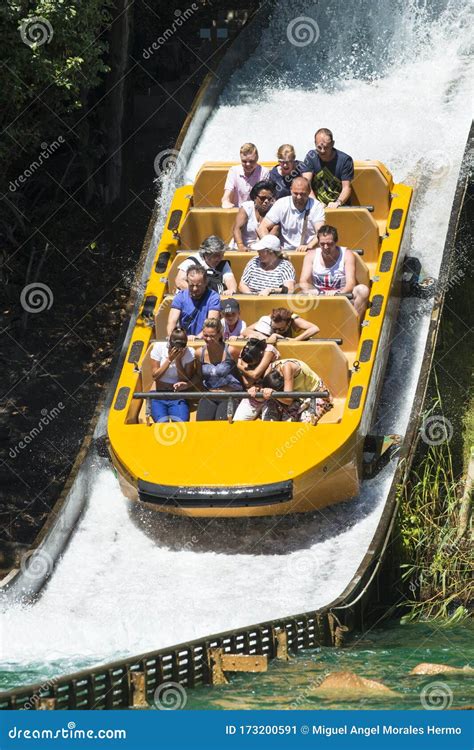 A Group of People Enjoying a Water Ride in a Park Editorial Photo ...