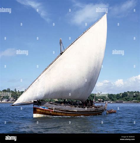 Kenya, Lamu Island, Lamu . A jahazi or small dhow (the wooden sailing boats of the region) sets ...