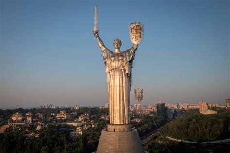 Ukraine replaces old Soviet symbols on iconic monument | FMT