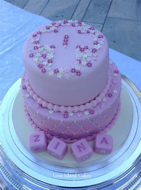 ZINA'S BAPTISM CELEBRATION CAKE A dusky pink-purple cake with sugar blocks and blossoms for Zina ...