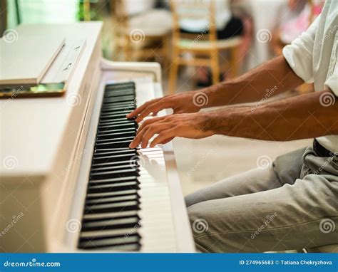 Male Pianist Hands on Grand Piano Keyboard - Music Event and Artist ...