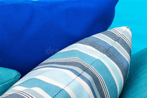 Colorful Pillows on a Blue Sofa. White, Blue, Dark Blue. Stock Image - Image of decorative ...