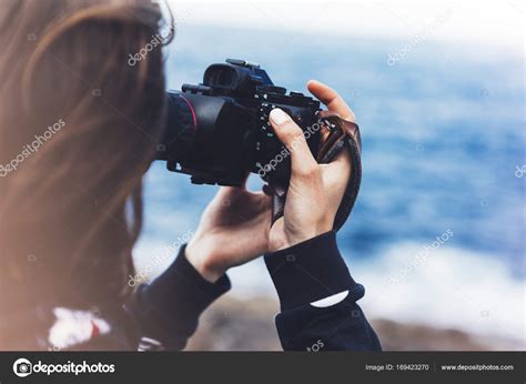 Tourist traveler photographer girl taking pictures — Stock Photo © Savenkomasha.gmail.com #169423270