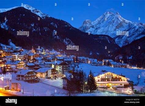 Village of Canazei in winter snow, The Dolomites, Val Di Fassa, Italy, Europe Stock Photo - Alamy