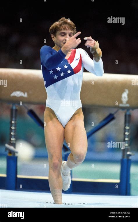 Kerri Strug (USA) lands her vault on a injured ankle at the 1996 Olympic Summer Games Stock ...