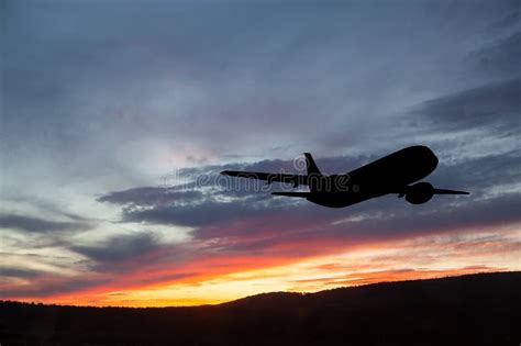 Airplane Taking Off at the Sunset Sky. Stock Photo - Image of aviation, business: 277236170