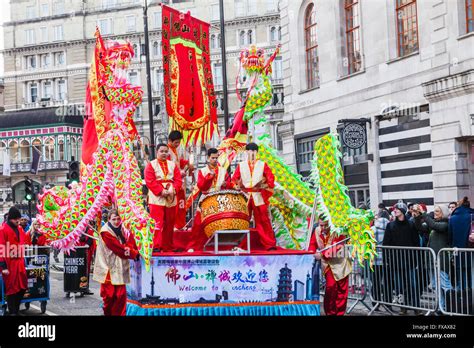 England, London, Chinatown, Chinese New Year Parade, Festival Float and Spectators Stock Photo ...