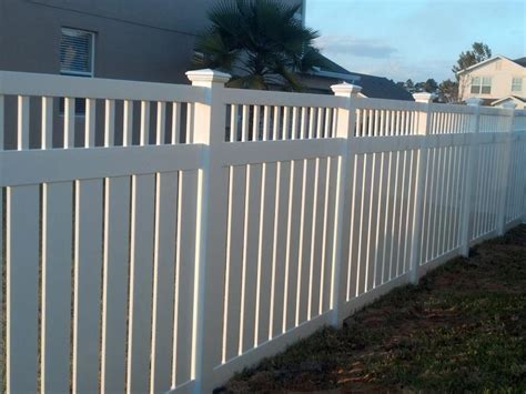White Vinyl Semi-Privacy Fence With Spindle Top Accent | Vinyl fence, Backyard fences, Fence design