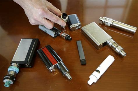 Juul, the vape device teens are getting hooked on, explained - Vox