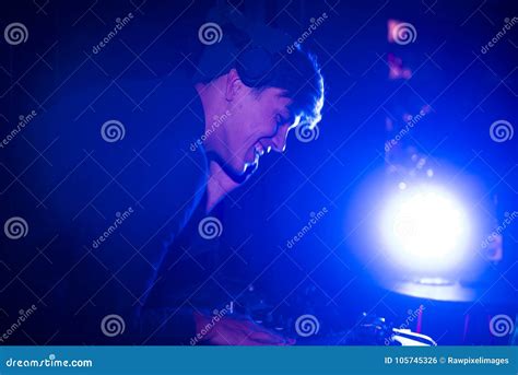 DJ Playing Music in a Night Pub Stock Photo - Image of alone, glam: 105745326