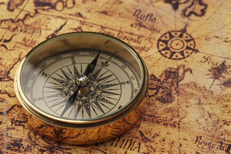 old compass on vintage map Stock Photo | Adobe Stock