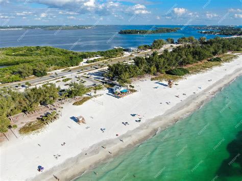 Premium Photo | Aerial view of coquina beach with white sand beach and the main road anna maria ...