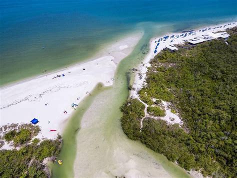 Clam Pass Beach In West Florida Is Hidden Behind A Boardwalk Of Mangroves